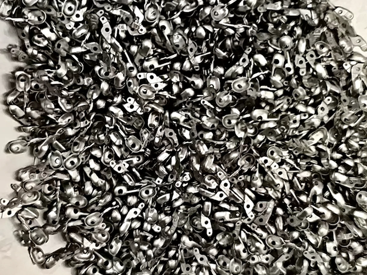 Batch of precision-stamped biopsy forceps cup components
