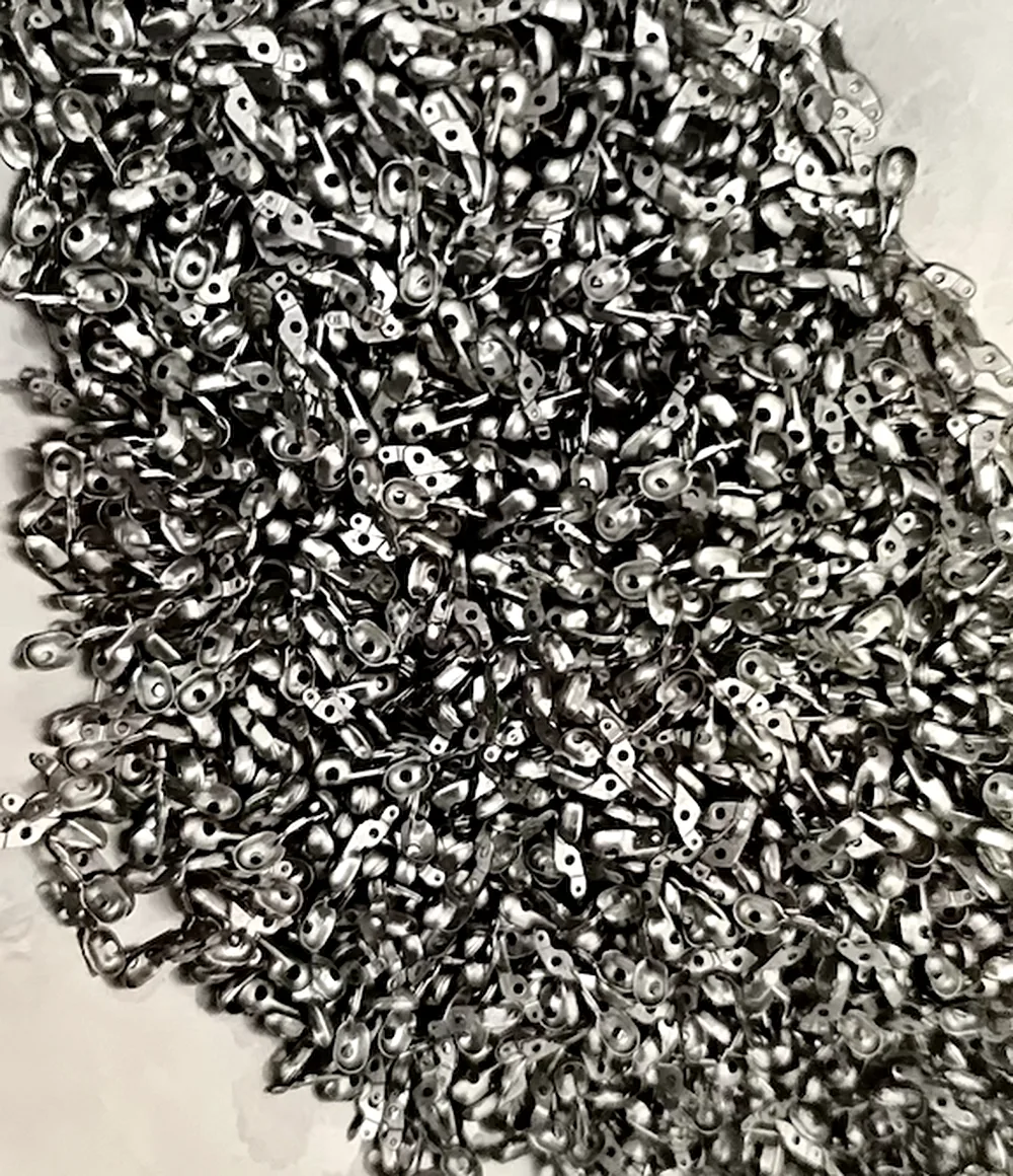 Precision-stamped biopsy forceps cup components